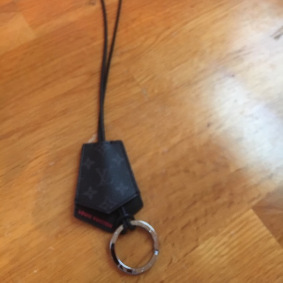 Louis Vuitton grey key chain/holder with strap. Never worn. Authentic. No flaws. - Picture 2 of 4